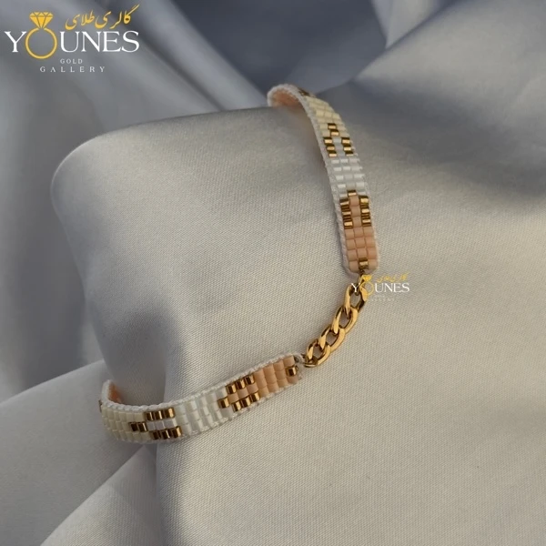 تصویر دوم دستبند میوکی صورتی طلایی کارتیر طلا